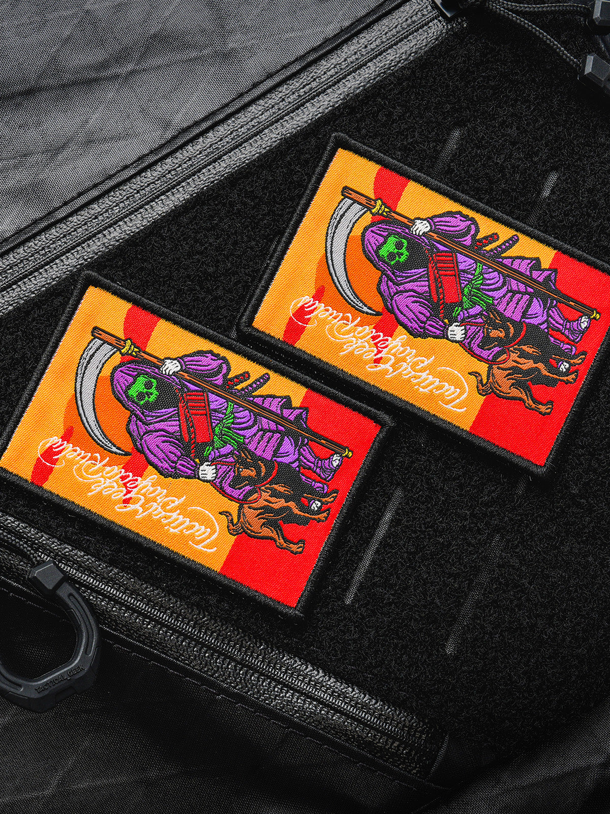 Two BG31 Tactical Geek patches arranged on a loop panel