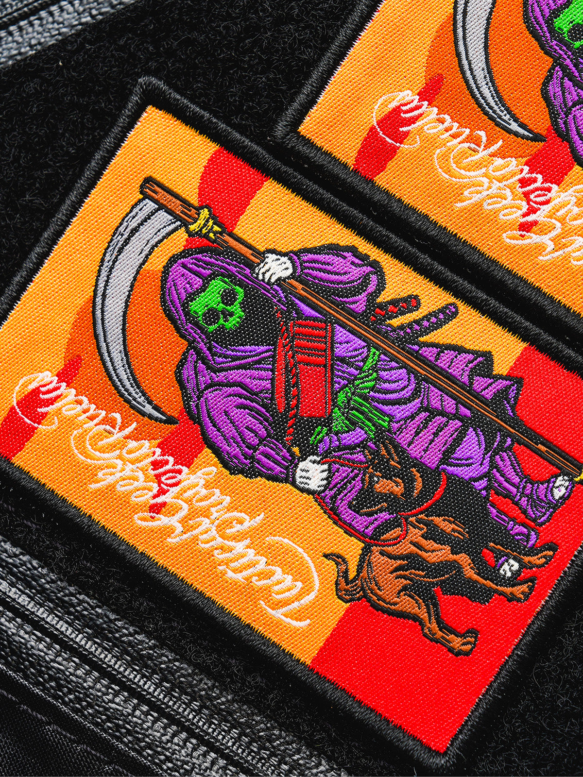 BG31 Tactical Geek patch attached to black loop fabric