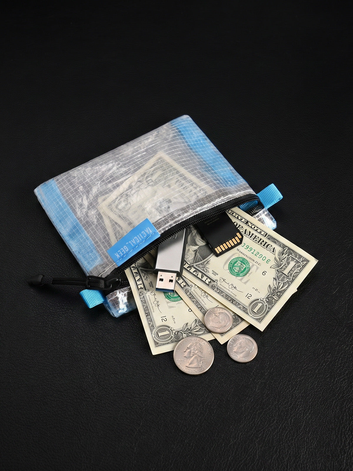 HS6 clear mini coin pouch with cash and coins arranged outside