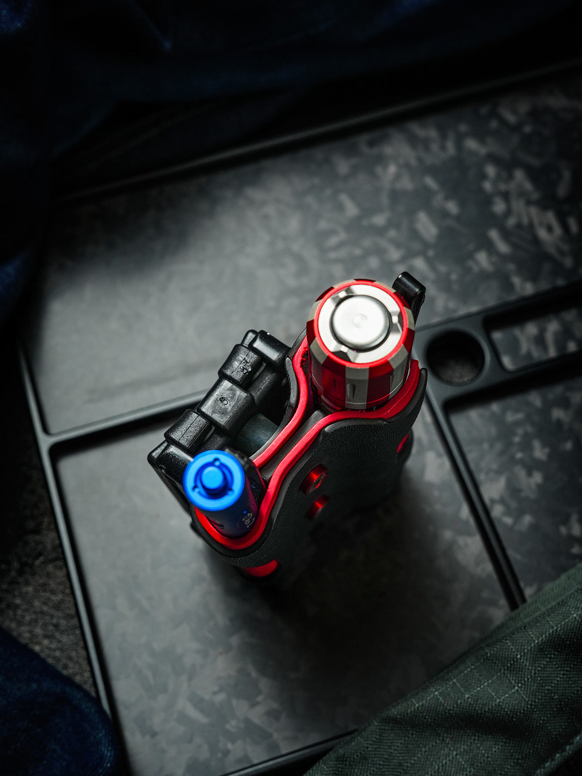 Dual-slot sheath top view with flashlight and pen inserted