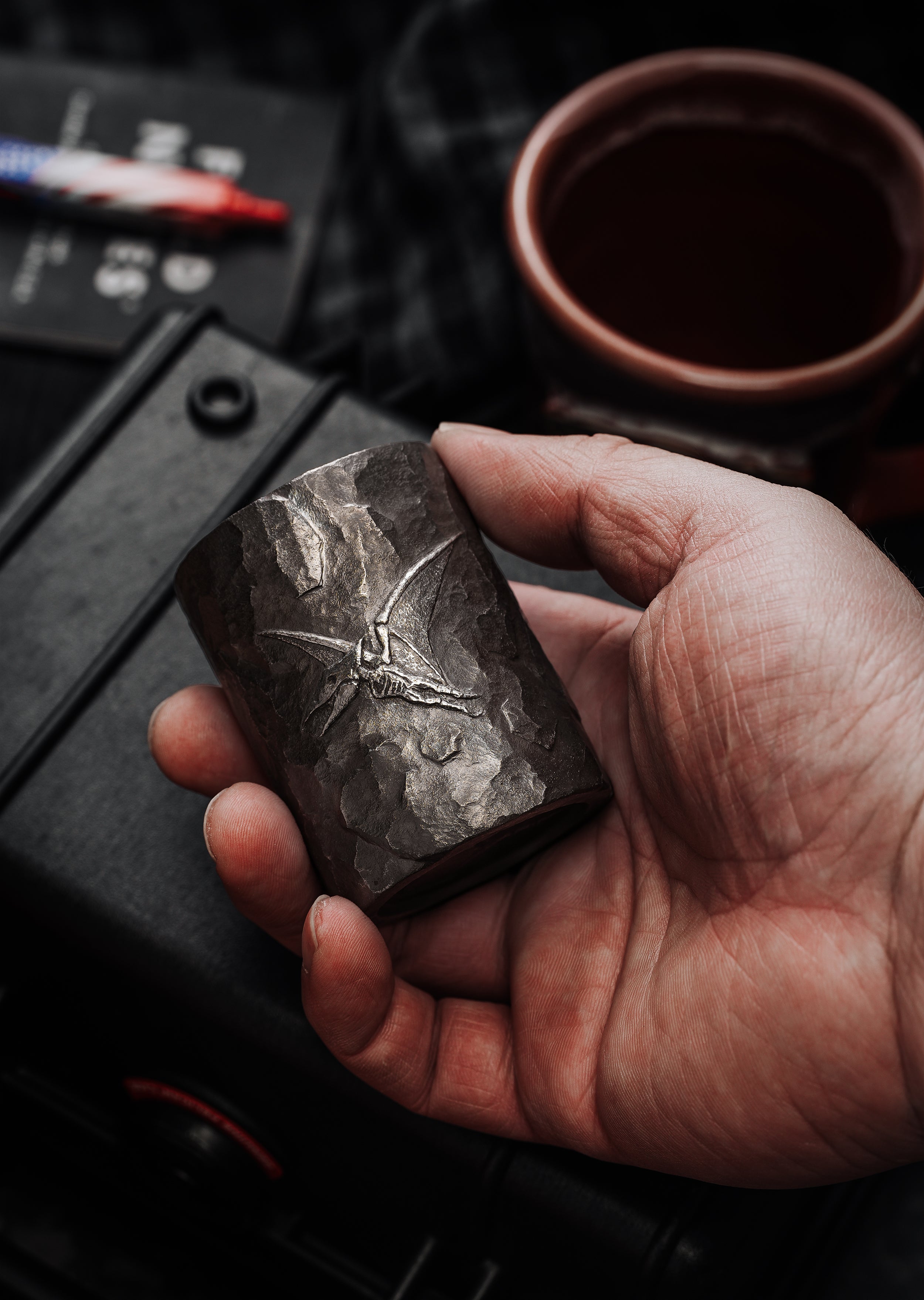 TacticalGeek x Sunizumi One-Off Hand-Carved Titanium Sake Cup: "Stone-Texture Pterosaur"